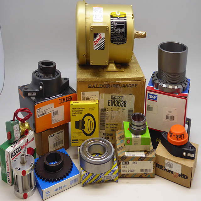 Surplus parts from our shelves in their original boxes, including a Baldor motor and Timken, SKF, INA, Dodge and Rexnord parts